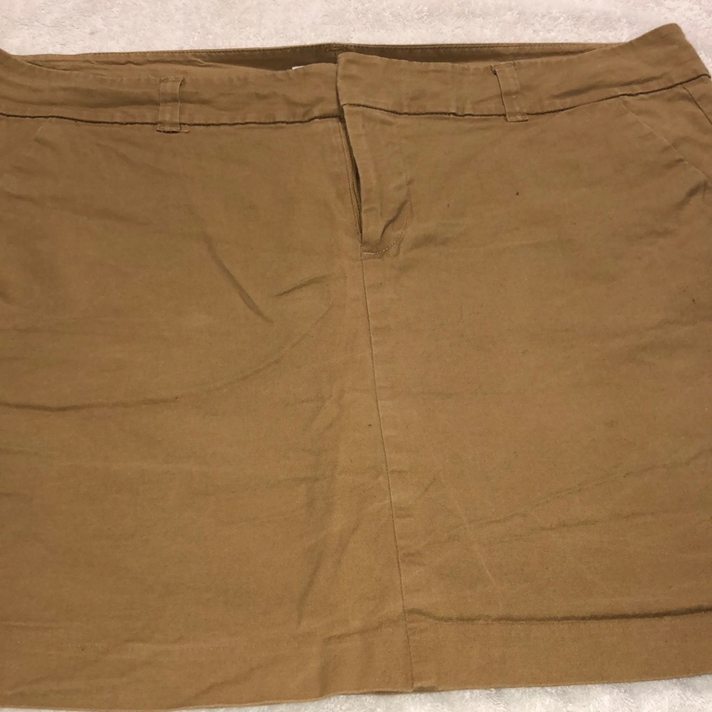 Khaki mini skirt.